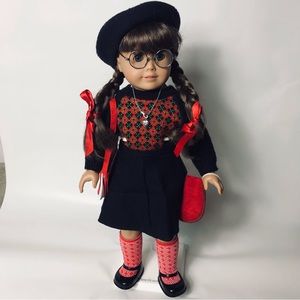 American girl Molly doll with accessories and brush.